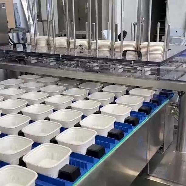 Containers on a manufacturing line