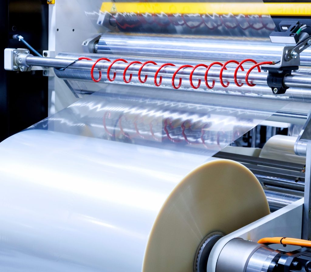 Roll stock being fed into a machine