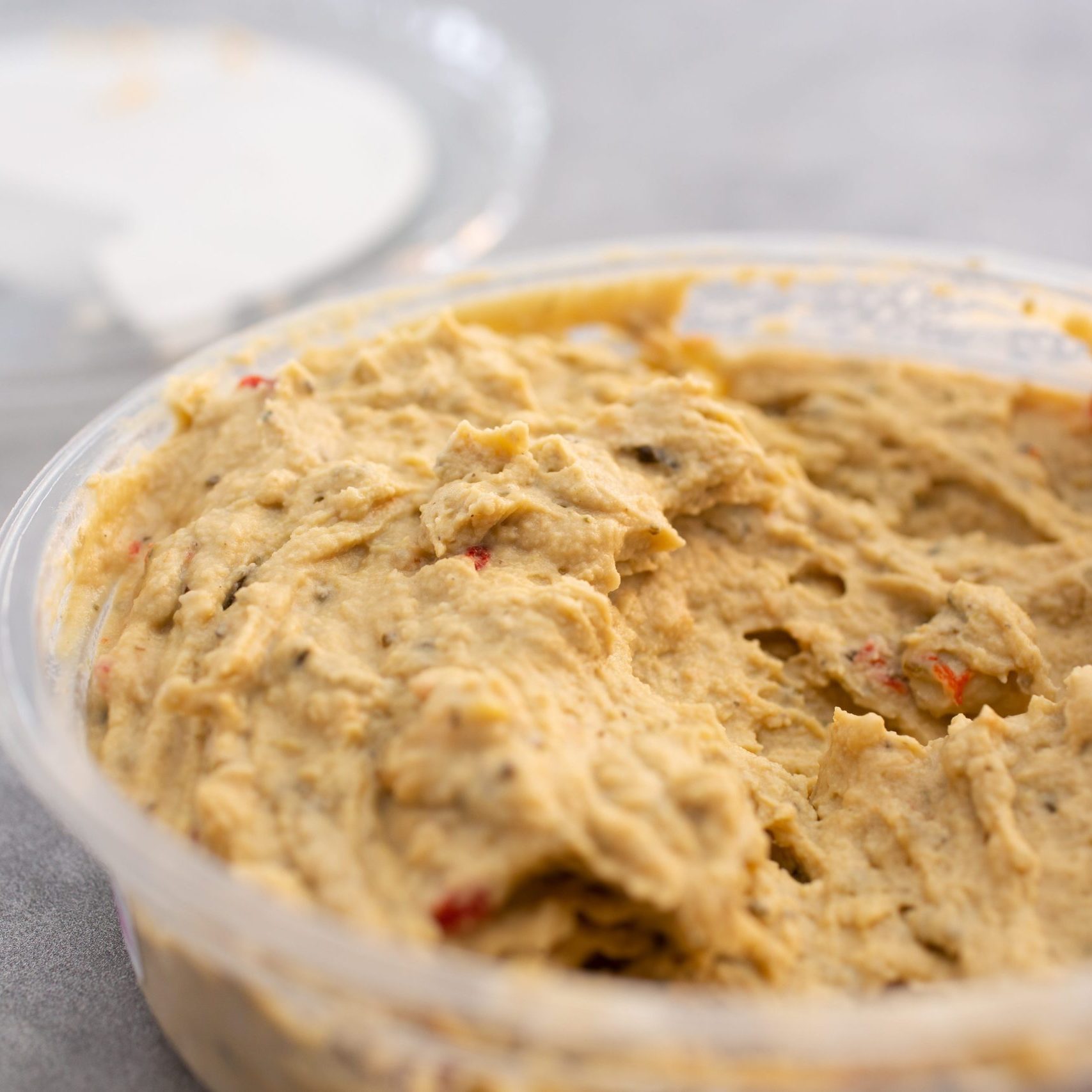 Close up of hummus in a container