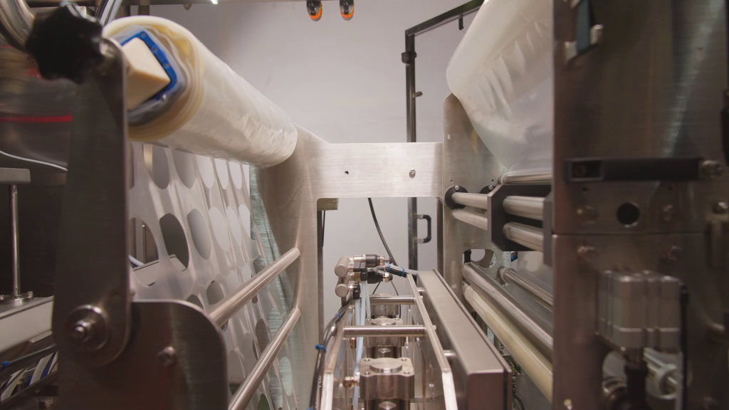 Packaging machine and materials working together