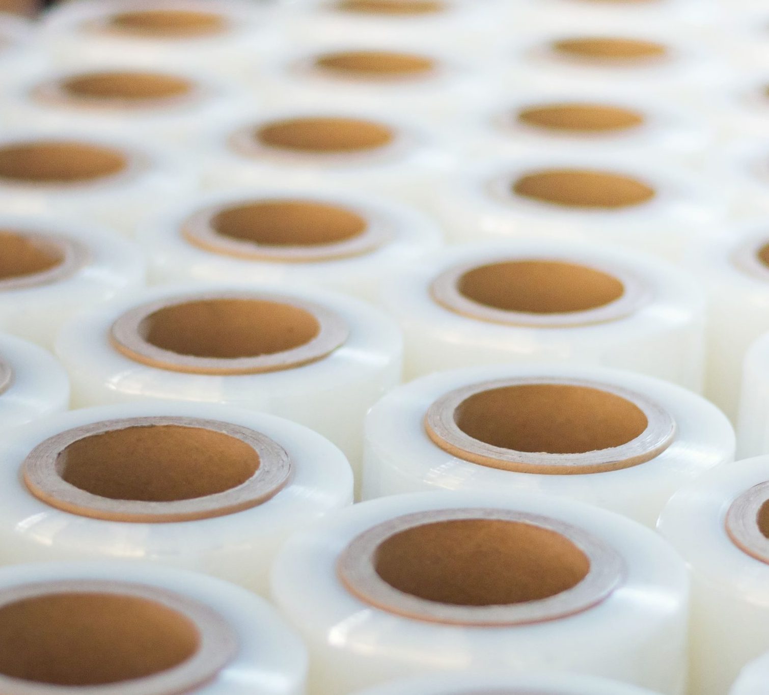 Rows and rows of roll stock in a warehouse
