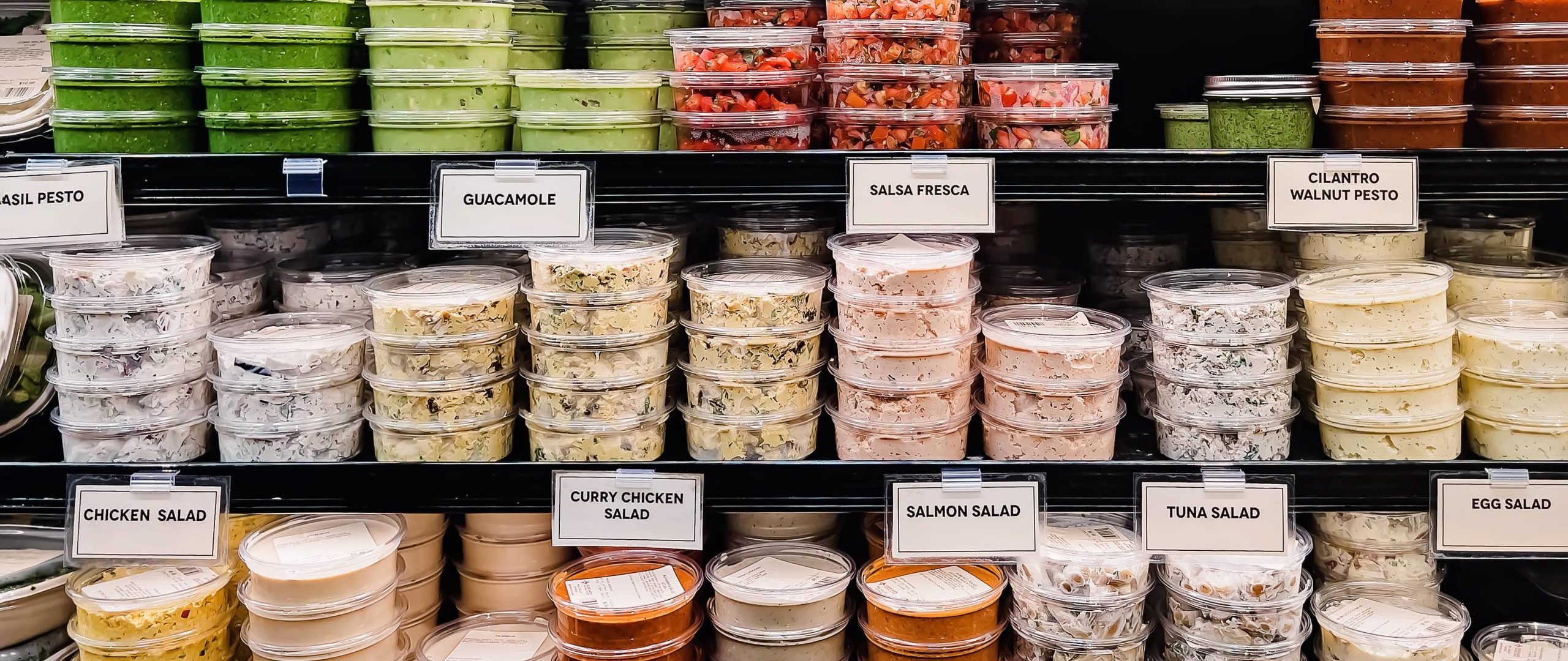 Grocery store shelves with individually packaged items